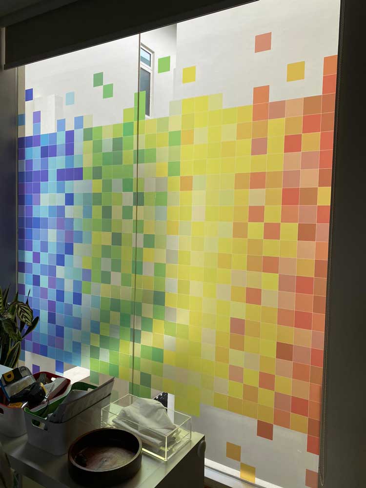 Colourful design film installed on glass