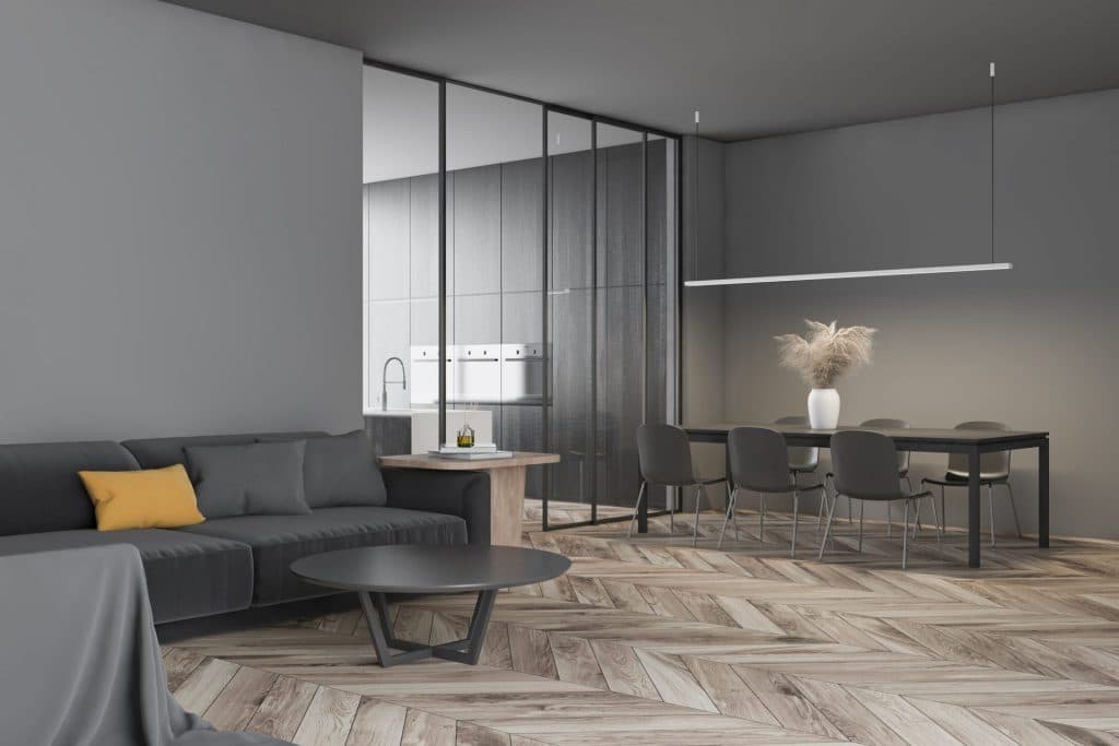 Living and dining area with expansive glazed partitions