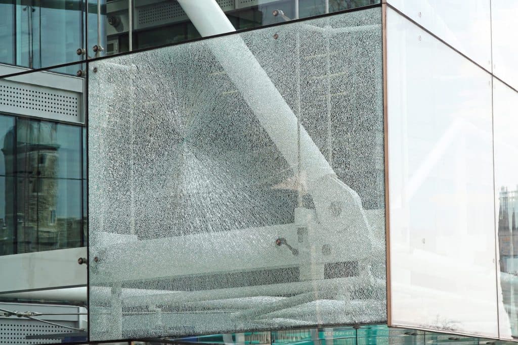 Broken glass retained across filmed glazing, from Basic Deco’s Safety Film page